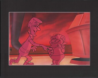 May include: A cel animation from The Jetsons featuring two characters in a red-toned setting. One character, in a futuristic outfit, points towards a smiling, round-bodied figure. The artwork is framed in black.