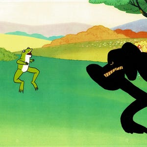 May include: A white ceramic mug with a black handle and the text "But First, Coffee" in a bold, black font. The mug is set against a neutral background, highlighting its simple design.