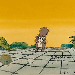 May include: A cartoon illustration of a squirrel standing on a tiled patio with a white egg in front of it. The background is a yellow sunset with green bushes and a palm tree.