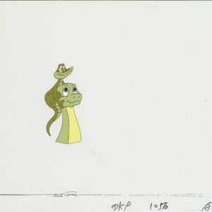 May include: A green cartoon dinosaur with a smaller green dinosaur on its head. Both dinosaurs have large eyes and are looking up.