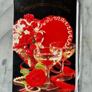 Tarjeta de compromiso de diseño Ansley de los años 90: temática romántica vintage con corazón rojo y champán; nueva y sin usar