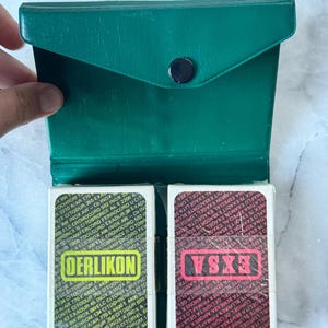 Juego de cartas vintage Oerlikon EXSA en estuche verde. 2 barajas selladas y nuevas. Regalo promocional. BARAJAS COMPLETAS.
