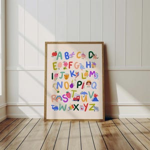 May include: A framed alphabet poster with colorful illustrations for each letter. The letters are in a variety of bright colors and are accompanied by corresponding images, such as an apple for A and a zebra for Z. The poster is in a wooden frame.