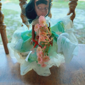 Vintage green dress Chiquita African American brmuda doll