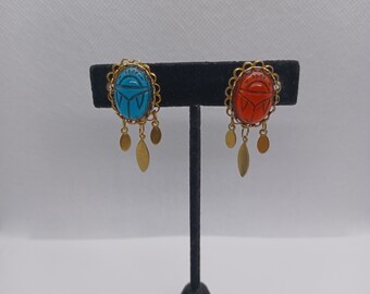 Vintage scarab blue and red clip on earrings.