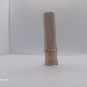 Vintage Revlon lipstick queen of diamonds. Empty lipstick case.