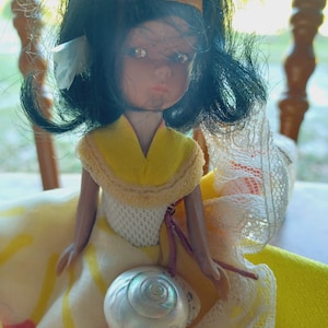 Vintage Yellow dress  chiquita African American  doll from bermuda
