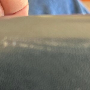 top front right of purse.