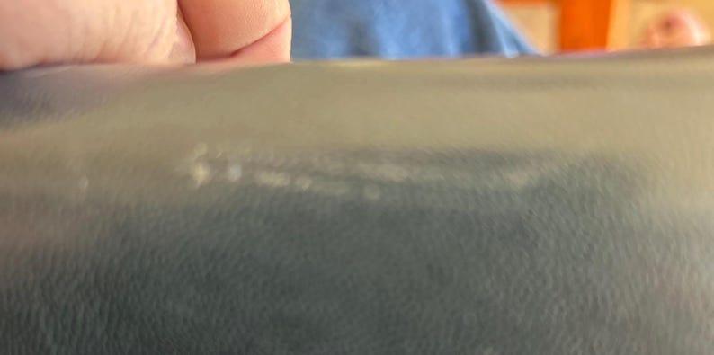 top front right of purse.