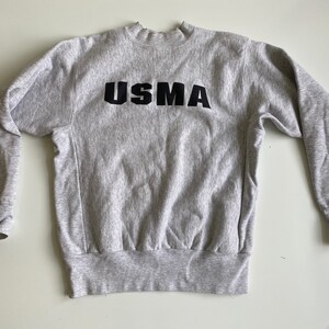 Champion sweater academy clearance west