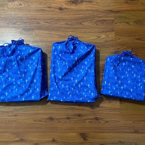 Christmas gift bags: Draw string bag, Blue background with star, Santa, reusable