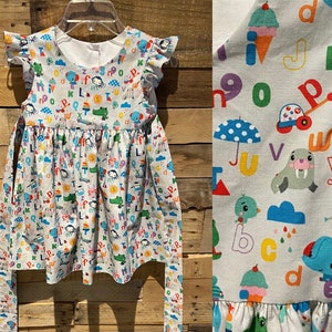 Alphabet girls dress, flutter sleeve alphabet animal toy dress, Retro style dress, Riley Blake fabric handmade.