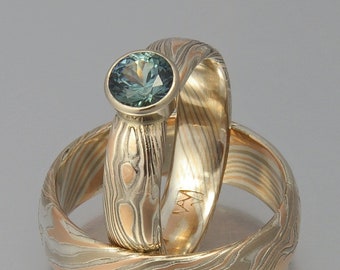 Custom Mokume Gane ring - 14 rose gold, 14k palladium white gold and silver with teal sapphire