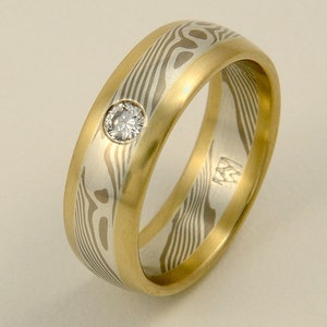 Custom Mokume Gane Ring -  14k palladium white gold and silver with 18k yellow gold edging and .07 carat diamond.