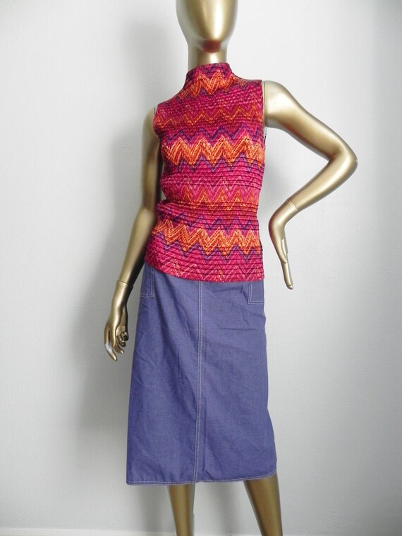 orange mock neck top