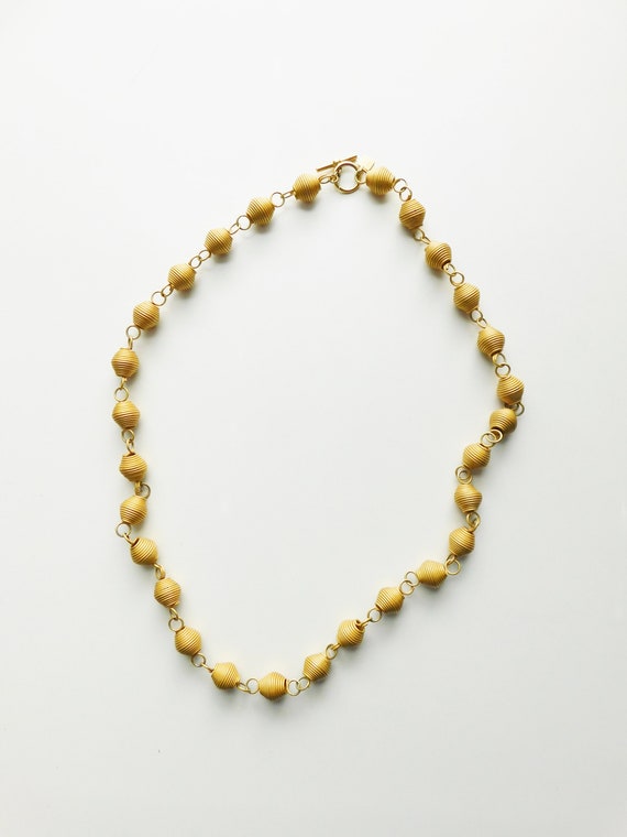 Vintage Brushed Golden Spiral Necklace \ Anne Klei