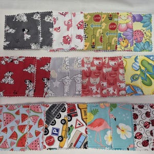 May include: A selection of patterned fabric squares featuring designs such as dalmatians, owls, cats, stop signs, flowers, and watermelons. The squares are arranged in rows, displaying a range of colours and patterns, ideal for craft projects.