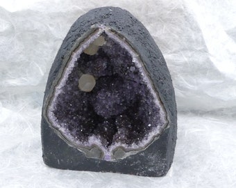 Large amethyst geode, glittering and shimmering inside.