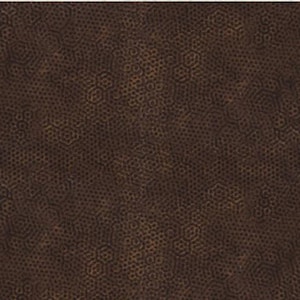 May include: A close-up of a brown leather texture with a subtle pattern of small circles and lines.