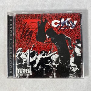 May include: A CKY Volume 1 CD in a clear plastic case. The cover features a red background with black and white illustrations of a band performing. The text "CKY" and "Volume 1" are visible, along with the Parental Advisory Explicit Lyrics label.