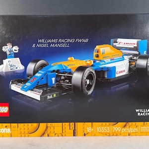 May include: A LEGO Icons box set featuring the Williams Racing FW14B race car and Nigel Mansell. The model is predominantly blue and orange, with black tires and sponsor logos. The box also shows a small LEGO figure and the text "WILLIAMS RACING".