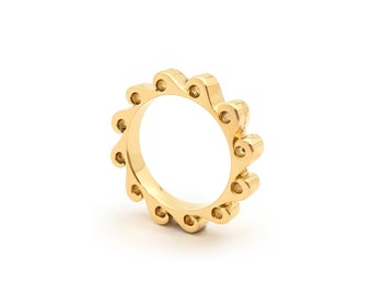 750/1000 yellow gold wave ring.