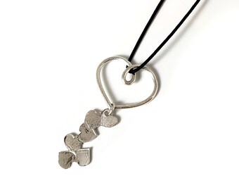 Pendentif coeurs multiples en argent 925.