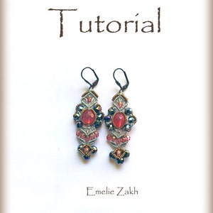 May include: A pair of silver and pink beaded earrings with a red gemstone in the centre. The earrings are hanging from a white background with the word "Tutorial" and the name "Emelie Zakk" written below.