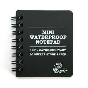 May include: A black mini waterproof notepad with a white spiral binding. The notepad has white text that reads "MINI WATERPROOF NOTEPAD 100% WATER-RESISTANT 50 SHEETS STONE PAPER" and a white logo that reads "P MOLYMATH PRODUCTS".