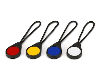ZipFlector – High Visibility retroreflective Zipper pulls. for School Bags, Clothing, Running, Cycling and Outdoor pursuits. UK-Made.