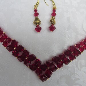 Preciosa Siam V shaped necklace, earrings sparkle with red radiance