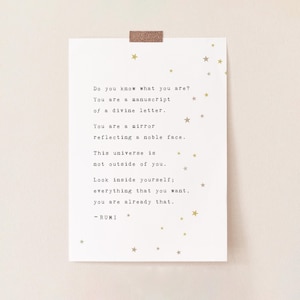 May include: A white printable quote card with gold stars and the text "Do you know what you are? You are a manuscript of a divine letter. You are a mirror reflecting a noble face. This universe is not outside of you. Look inside yourself; everything that you want, you are already that. - RUMI"