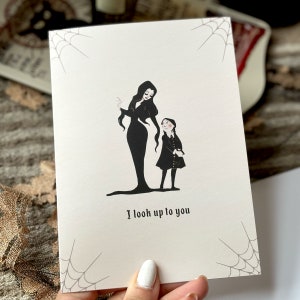 Alternative Mother's Day card Morticia and Wednesday Addam's "I look up to you"