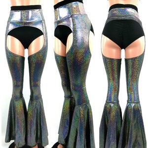 May include: Black and silver iridescent flared pants with a high waist and cutouts on the sides. The pants have a wide leg and a ruffled hem.