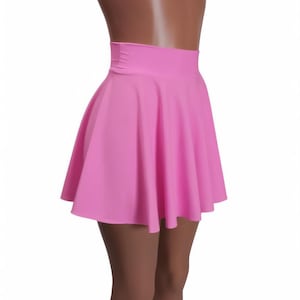 May include: A pink skater skirt with a high waistline. The skirt is made of a smooth, stretchy fabric.