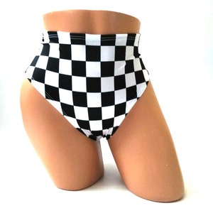 May include: High-waisted black and white checkered underwear. The underwear is made of a stretchy fabric and has a high-cut leg.