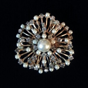 Rhinestones and Pearls set in Goldtone Metal