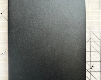 Black moleskin journal/8x10/lined