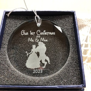 Our First Christmas as Mr & Mrs Silhouette Couple Crystal Wedding Ornament and Christmas ornament. Made In The USA