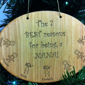 May include: A wooden ornament with the text "The 7 BEST reasons for being a NANA!" and seven stick figure drawings of children with their names: Michael, Thomas, Molly, Kimberly, Jasper, and Nicols.