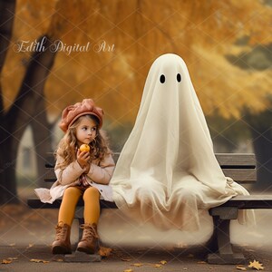 May include: A young girl in a pink hat and yellow pants sits on a wooden bench with a white ghost. The girl is holding a small yellow apple. The background is a blurry image of fall foliage.