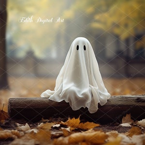 May include: A white ghost costume sits on a log in a forest setting. The ghost has two black eyes and is made of a sheer fabric. The log is surrounded by fallen autumn leaves.