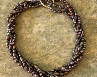 Grey freshwater pearl multi strand necklace.