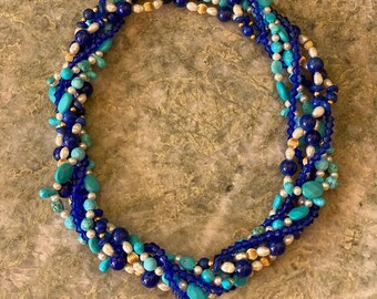 Multi strand turquoise, lapis, crystal and freshwater pearl necklace.