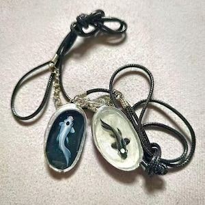 yin yang koi fish necklace in the shell Avatar The Last Airbender