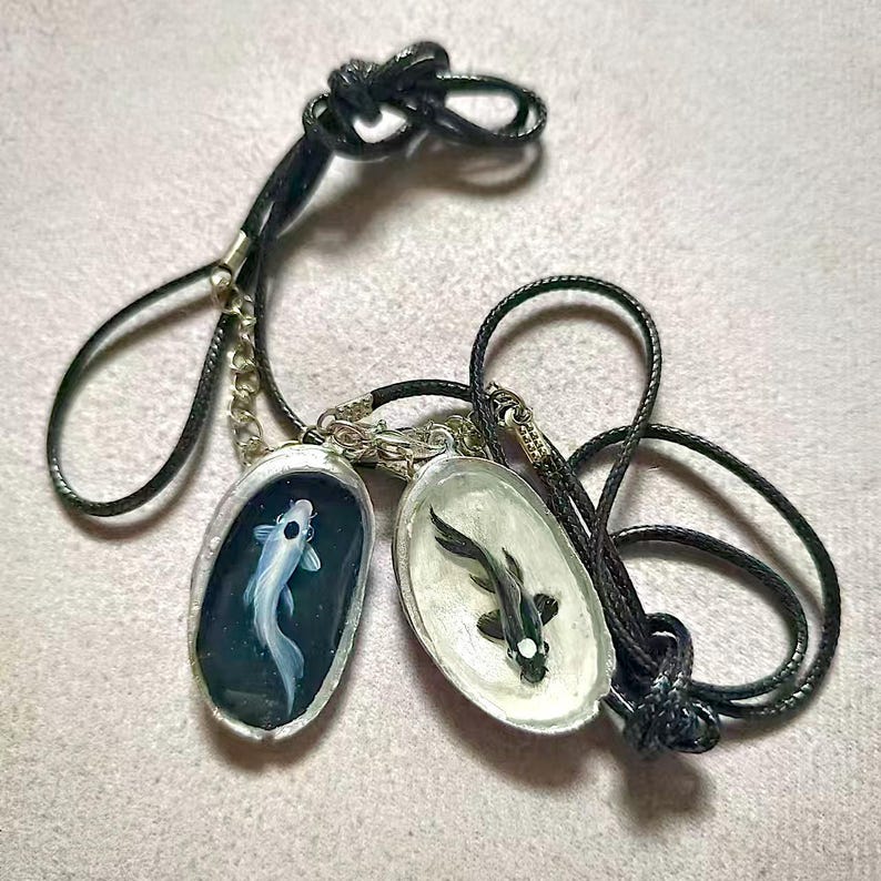yin yang koi fish necklace in the shell Avatar The Last Airbender