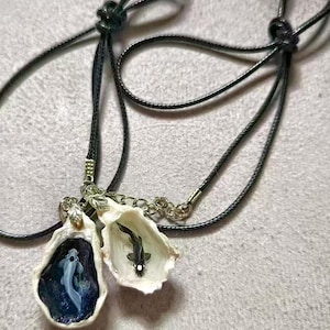 yin yang koi fish necklace in the oyster shell Avatar The Last Airbender