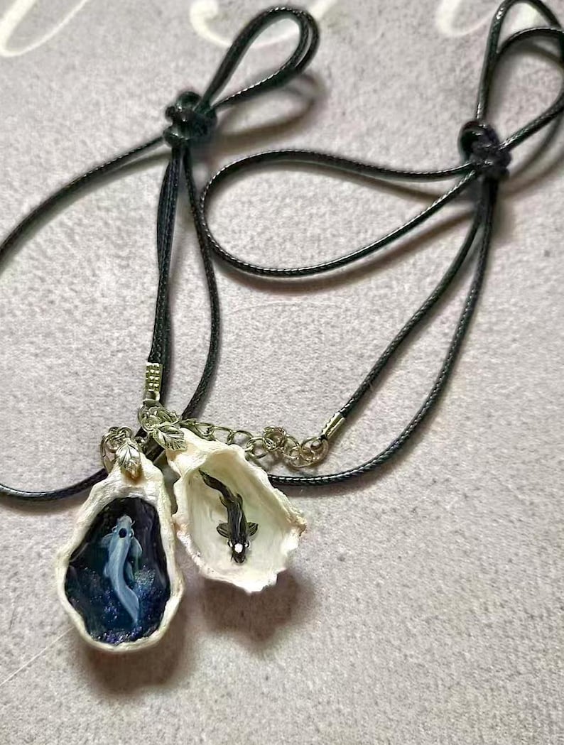 yin yang koi fish necklace in the oyster shell Avatar The Last Airbender