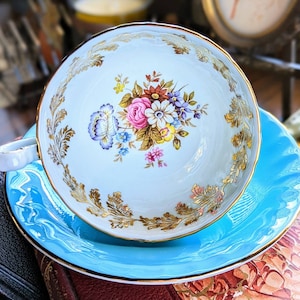 Vintage Aynsley Bone China Wide Mouthed Blue/Turquoise Footed Teacup & Saucer Duo With Gold Accents And Floral Bowl-Made In England, 1970s