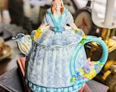 → View on Etsy: Royal Crown Germany Dutch Girl Teapot: Vintage Floral Basket Handle Royal Crown Germany Dutch Girl Teapot: Vintage Floral Basket Handle
